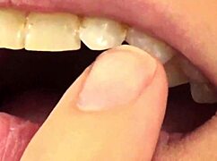 i'm watching fifi foxx eat gummy bears up close with mouth vore