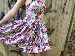 public blowjob from a stunning beauty in a dress showing off her skills