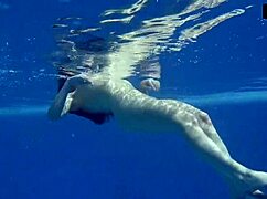 is mia ferrari, that super hot russian brunette teen, posing in red lingerie by the pool underwater?