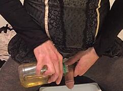 Golden piss flows from that dirty old drunk guy