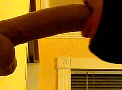 Watch this gay guy in hood deepthroat a dildo?