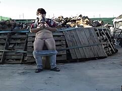 fucking on a log outdoors, this horny couple couldn't wait. their public display turned heads with raw passion.