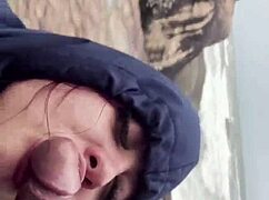 A busty young girl flashes her big ass and tits on the public beach, getting caught