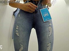 mysterious kathy trying on jeans in the changing room, showing off that big ass