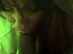 Mature white woman sucks small black cock in detailed blowjob scene.