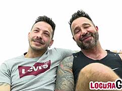 John Brachalli fucks Martin Mazza hard on the sofa with big cocks bareback