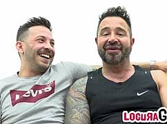 John Brachalli fucks Martin Mazza hard on the sofa with big cocks bareback