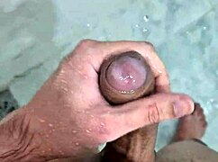 Gordinho enjoying a solo moment in the bathroom shower