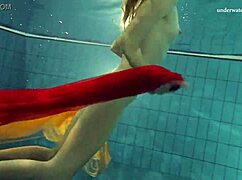 Nastya strips bare and flaunts hot naked body in pool