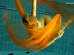 Nastya strips bare and flaunts hot naked body in pool