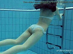 Roxalana Cheh Poses As Sexy Redhead Underwater
