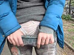 beautiful slut exposes herself in london streets, pissing and masturbating openly.
