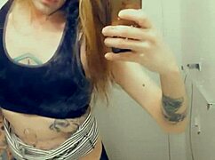 Pretty transsexual in miniskirt and stockings shows off her small cock while masturbating