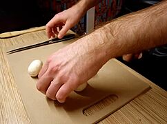 Naked Gay Chef Prepares Rice Noodle with Chicken and Vegetables in Kitchen