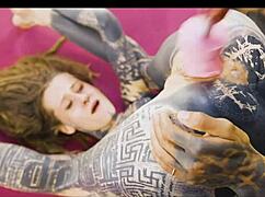 Tattoed goth couple engages in intense hard fucking with anal play and sloppy blowjob.