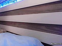 Hey, check this Japanese babe fingering her shaved pussy on solo webcam!