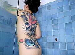 croatian babe shaves while using anal plug in shower