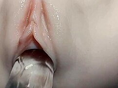 Wow, check this fake cock sliding into her tight pussy! 😜