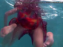 why does redhead b nikita vodorezova get naked so fast underwater on the public beach