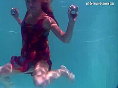 why does redhead b nikita vodorezova get naked so fast underwater on the public beach