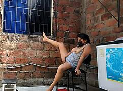 I was recording my neighbor fingering herself when she caught me