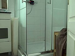 Stepson secretly watches stepmother in morning shower while masturbating in taboo family clip