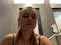 A teen fingers her pussy to orgasm in public outdoor spot