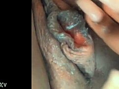 She rubs her pussy while fingering big ass and cock