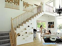 Lesbian babe gets fucked by strapon and squirts in closeup