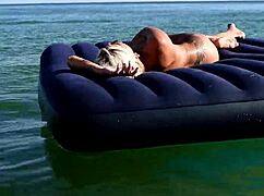 Nude Beach Blonde Bitch with Big Boobs and Dolphins Tattoo Exposed Outdoors