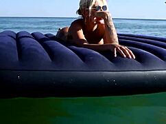 Nude Beach Blonde Bitch with Big Boobs and Dolphins Tattoo Exposed Outdoors