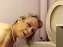 What does the housewife slave do in the toilet?