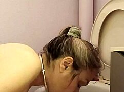 What does the housewife slave do in the toilet?