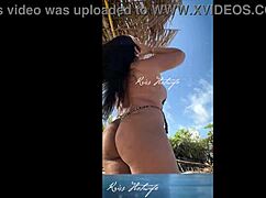 Married prostitute flaunts her juicy big ass on the beach with bikini stuffed inside