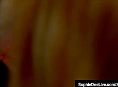 Busty Brit Sophie Dee intensely fucks lesbian Sea J Raw with licking and fingering in fishnets