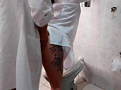 Nurse and Doctor Share Intimate Moment in Hospital Bathroom