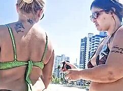me and my slutty friend fuck on the beach for everyone to see