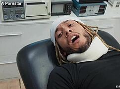 Nurse Ryan Reid Assists Patient in Hospital Room