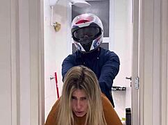 Motoboy bursts into women's bathroom, fucks peeing woman who cums hard on his monster cock.