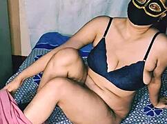 I felt so aroused watching this desi indian girl with big boobs shove a dildo into her hairy wet pussy while moaning loudly