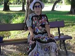 look at that hairy mature flashing her pussy in the park