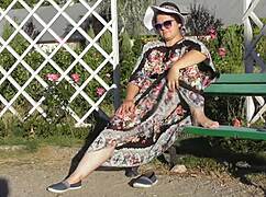 look at that hairy mature flashing her pussy in the park