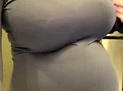 the pregnant stepmother slowly reveals her milky tits from the red bra in the quiet room