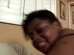 Ebony BBW in fishnet stockings shows off big ass and tits suggestively