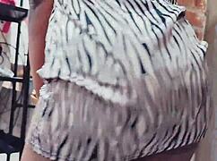 Ebony stripper twerks her booty in a sexy dress at the club