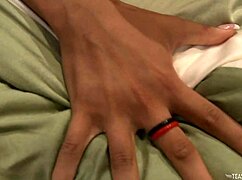 Amazing performer Ami Q mounts on a long object in the bedroom. Bent over with small tits.