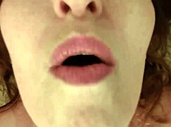 dawn worships shawn's big black cock, getting it rock hard right at the door