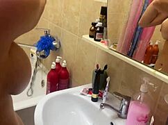 Spying On My Stepsister With Big Tits In The Bathroom