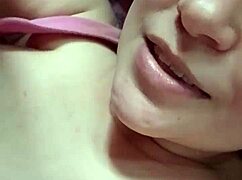 blonde strips naked in bed and invites you to call her whatsapp number for a fee