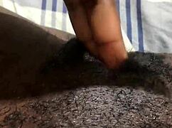 in this casual homemade video, a black amateur plays with her wet pussy until orgasm